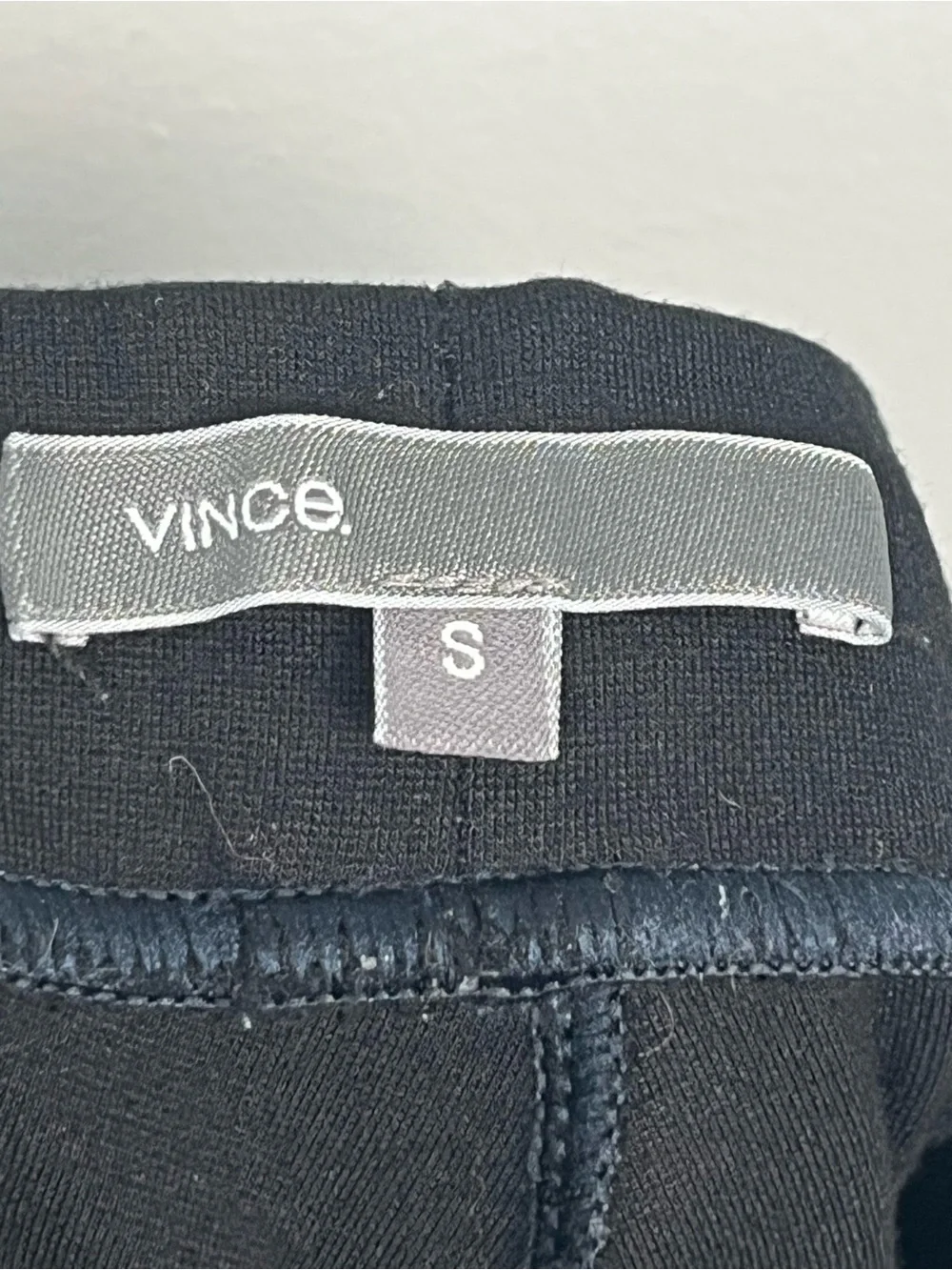 Vince black ponte knit back seam leggings, size small.